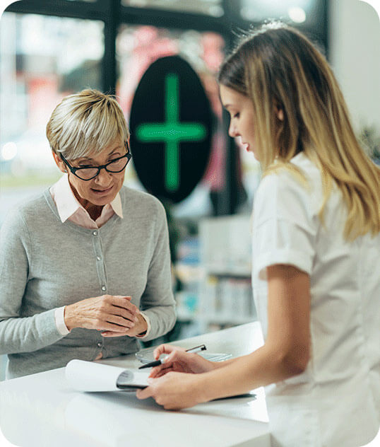 Pharmacist consulting with patient about switching Wegovy tablet treatment to Pharmacy Planet